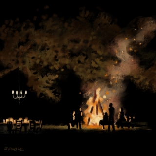 Several people around a giant bonfire at night. To the left is a table with candles and a chandelier hanging from a tree.